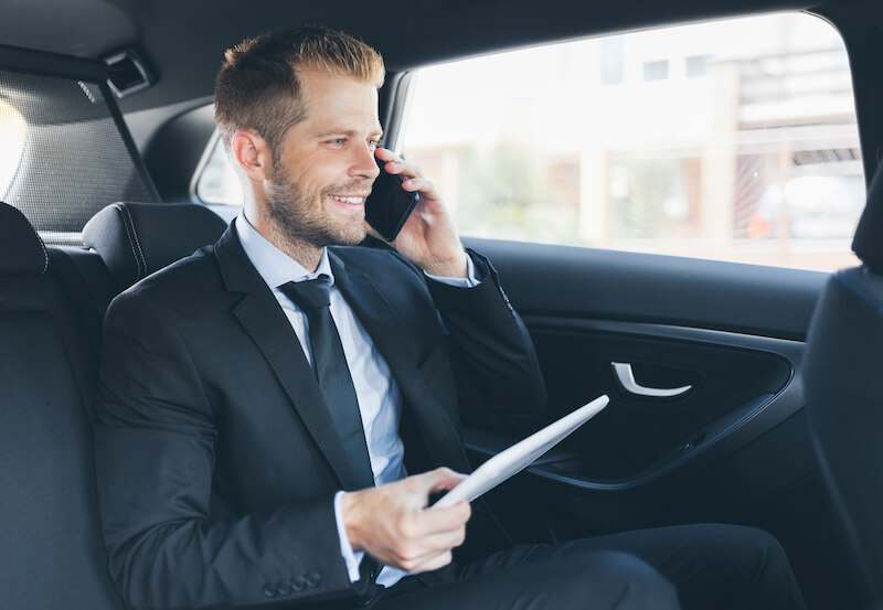 businessman in a chauffeur businessman in a chauffeur