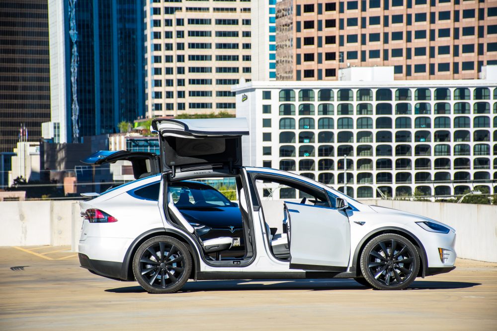 Luxury corporate transfer transport chauffeur private hire tesla
