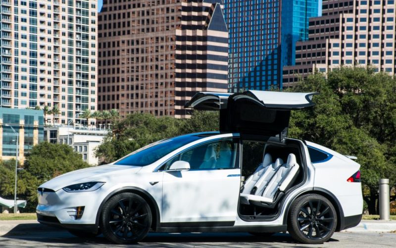 Luxury corporate transfer transport chauffeur private hire Tesla