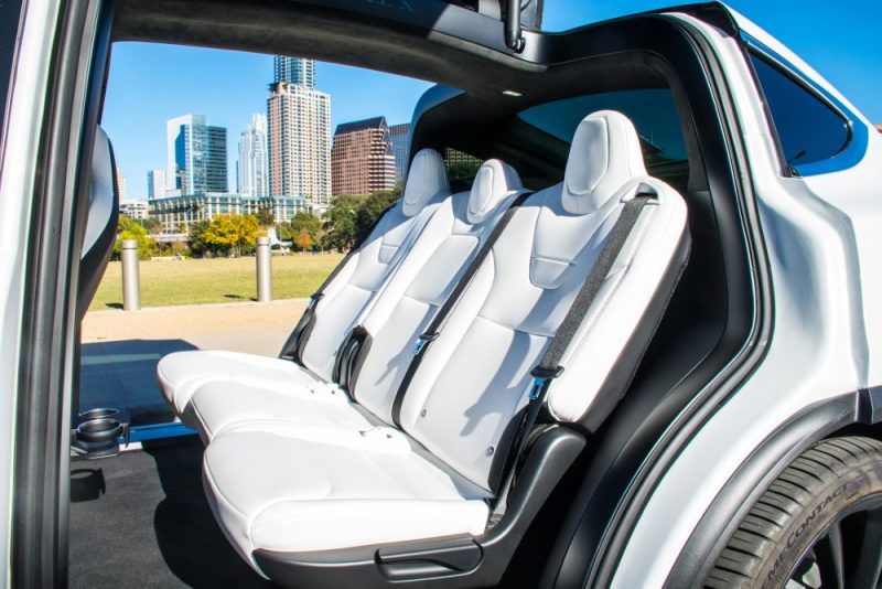Luxury corporate transfer transport chauffeur private hire Tesla